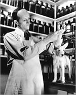 Dr. Mark Morris Sr. with dog in the lab